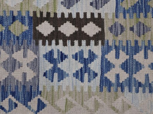 Backside of handmade New Modern Design rug showing knot structure and weave density