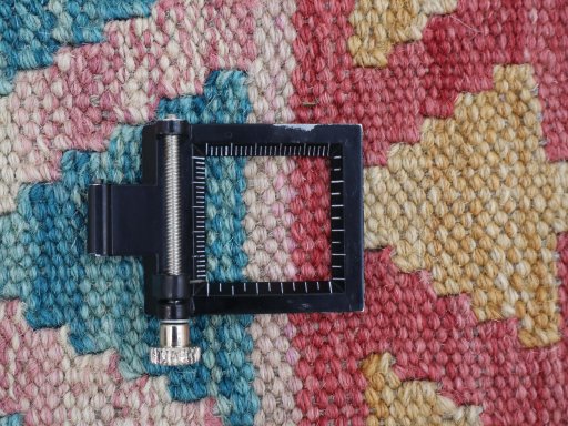 Corner detail of New Modern Design rug showing border pattern and Wool pile