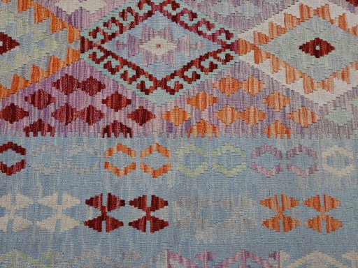 Backside of handmade New Modern Design rug showing knot structure and weave density