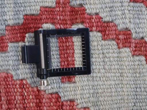 Corner detail of New Modern Design rug showing border pattern and Wool pile