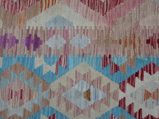 Backside of handmade New Modern Design rug showing knot structure and weave density