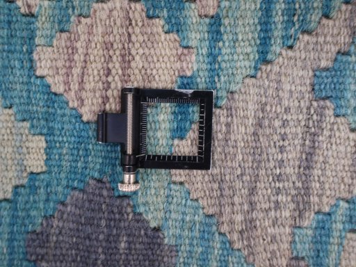 Corner detail of New Modern Design rug showing border pattern and Wool pile