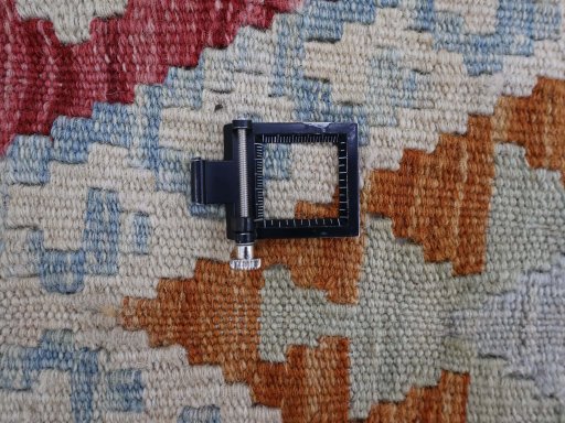 Corner detail of New Modern Design rug showing border pattern and Wool pile