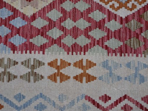 Backside of handmade New Modern Design rug showing knot structure and weave density