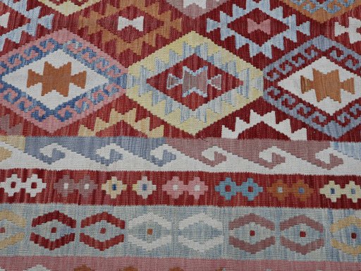 Backside of handmade New Modern Design rug showing knot structure and weave density