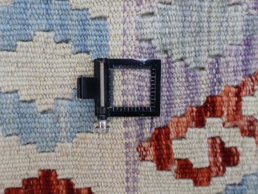 Corner detail of New Modern Design rug showing border pattern and Wool pile