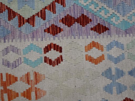 Backside of handmade New Modern Design rug showing knot structure and weave density