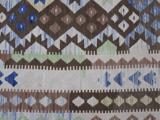 Backside of handmade New Modern Design rug showing knot structure and weave density