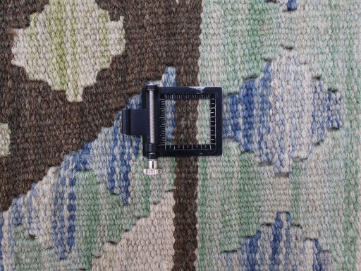 Corner detail of New Modern Design rug showing border pattern and Wool pile