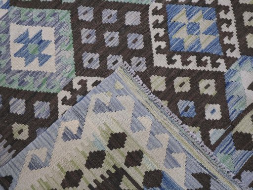 Surface texture of New Modern Design rug with natural Wool and intricate pattern