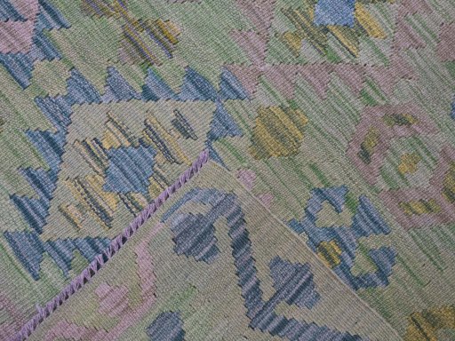 Surface texture of New Modern Design rug with natural Wool and intricate pattern