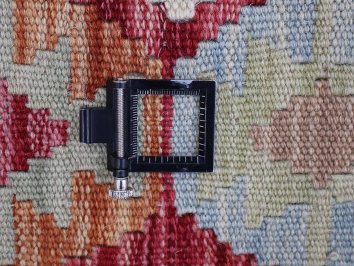 Corner detail of New Modern Design rug showing border pattern and Wool pile