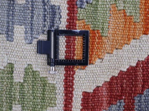 Corner detail of New Modern Design rug showing border pattern and Wool pile