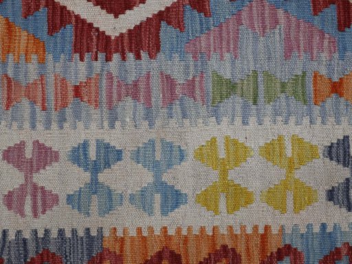 Backside of handmade New Modern Design rug showing knot structure and weave density