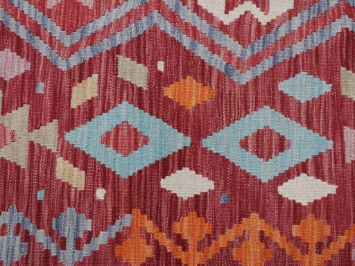 Backside of handmade New Modern Design rug showing knot structure and weave density