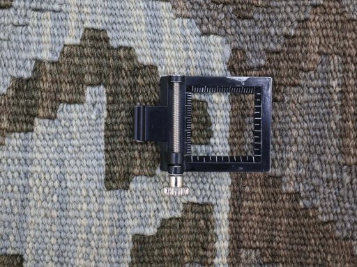 Corner detail of New Modern Design rug showing border pattern and Wool pile