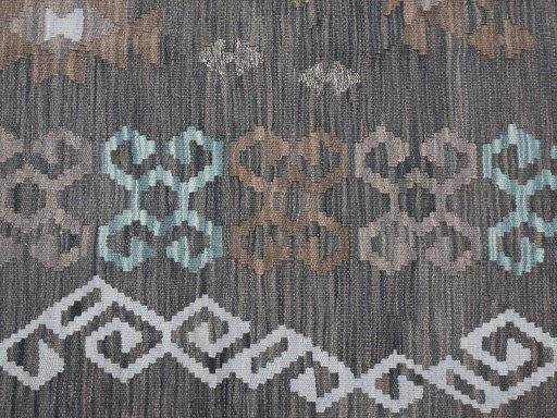 Backside of handmade New Modern Design rug showing knot structure and weave density
