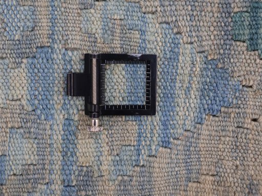 Corner detail of New Modern Design rug showing border pattern and Wool pile