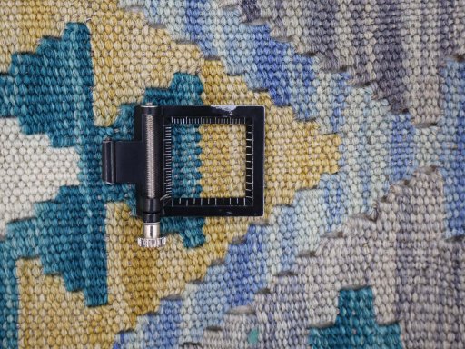 Corner detail of New Modern Design rug showing border pattern and Wool pile
