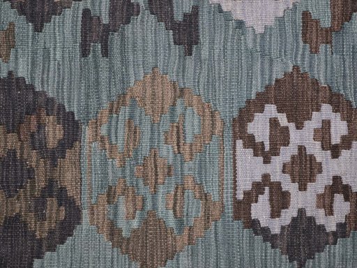 Backside of handmade New Modern Design rug showing knot structure and weave density