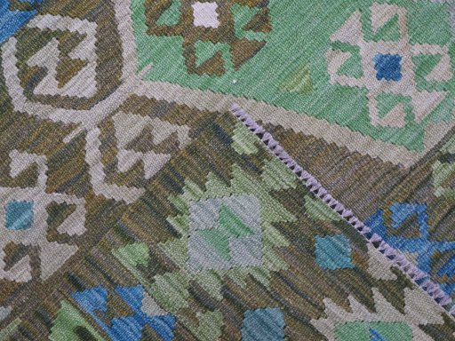 Surface texture of New Modern Design rug with natural Wool and intricate pattern