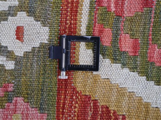 Corner detail of New Modern Design rug showing border pattern and Wool pile