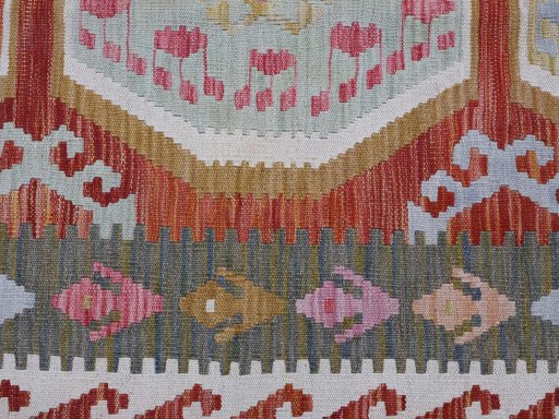 Backside of handmade New Modern Design rug showing knot structure and weave density