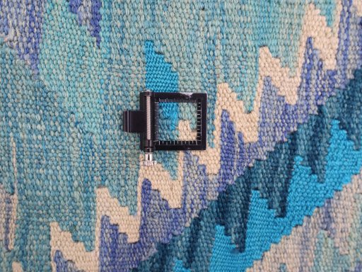 Corner detail of New Modern Design rug showing border pattern and Wool pile