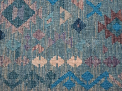 Backside of handmade New Modern Design rug showing knot structure and weave density