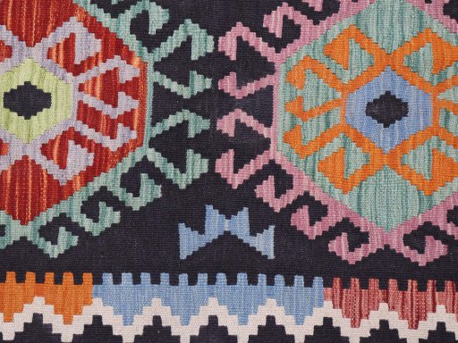 Backside of handmade New Modern Design rug showing knot structure and weave density