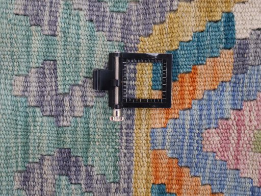 Corner detail of New Modern Design rug showing border pattern and Wool pile