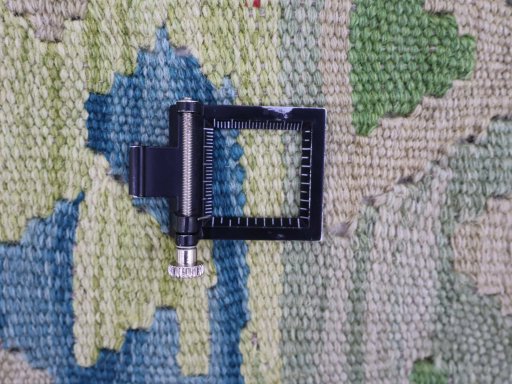 Corner detail of New Modern Design rug showing border pattern and Wool pile