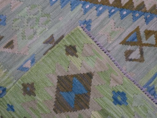 Surface texture of New Modern Design rug with natural Wool and intricate pattern