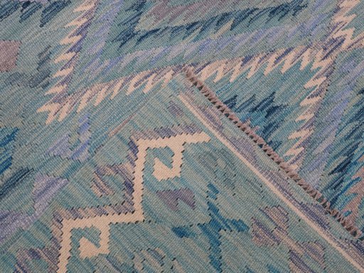 Surface texture of New Modern Design rug with natural Wool and intricate pattern