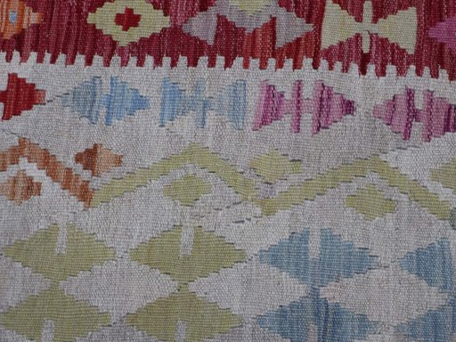 Backside of handmade New Modern Design rug showing knot structure and weave density