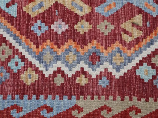 Backside of handmade New Modern Design rug showing knot structure and weave density