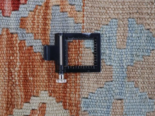 Corner detail of New Modern Design rug showing border pattern and Wool pile