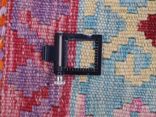 Corner detail of New Modern Design rug showing border pattern and Wool pile