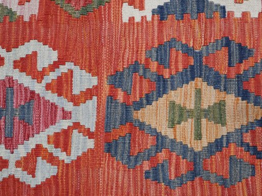 Backside of handmade New Modern Design rug showing knot structure and weave density