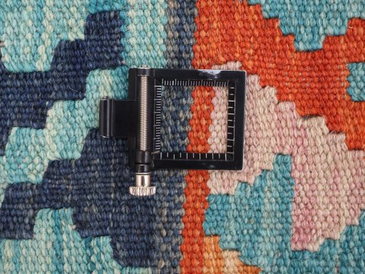 Corner detail of New Modern Design rug showing border pattern and Wool pile