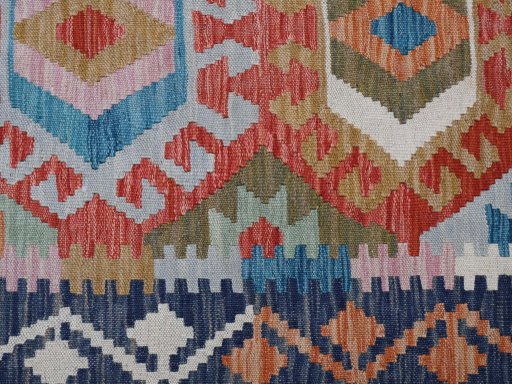Backside of handmade New Modern Design rug showing knot structure and weave density