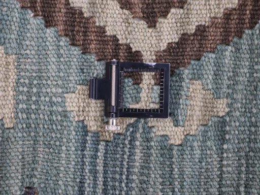 Corner detail of New Modern Design rug showing border pattern and Wool pile