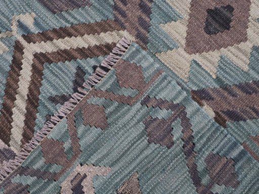 Surface texture of New Modern Design rug with natural Wool and intricate pattern