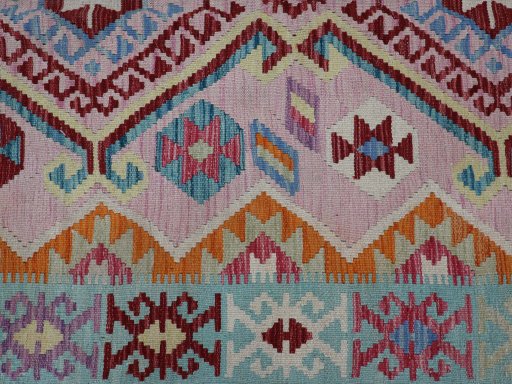 Backside of handmade New Modern Design rug showing knot structure and weave density