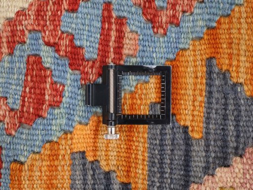 Corner detail of New Modern Design rug showing border pattern and Wool pile