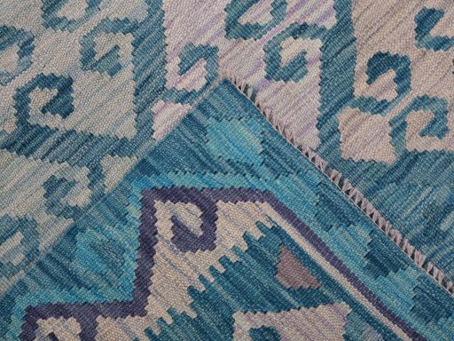 Surface texture of New Modern Design rug with natural Wool and intricate pattern