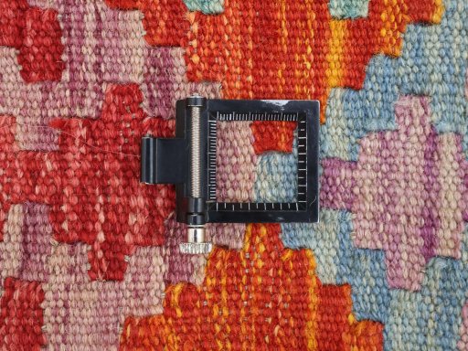 Corner detail of New Modern Design rug showing border pattern and Wool pile