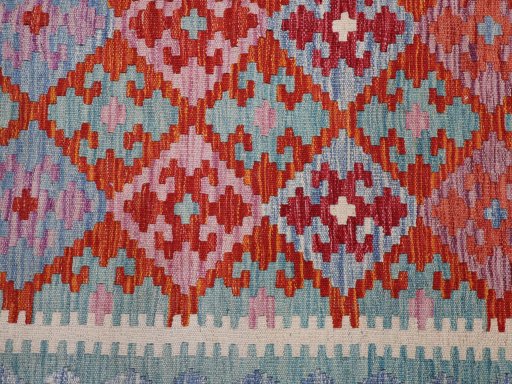 Backside of handmade New Modern Design rug showing knot structure and weave density