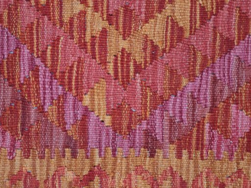 Backside of handmade New Modern Design rug showing knot structure and weave density