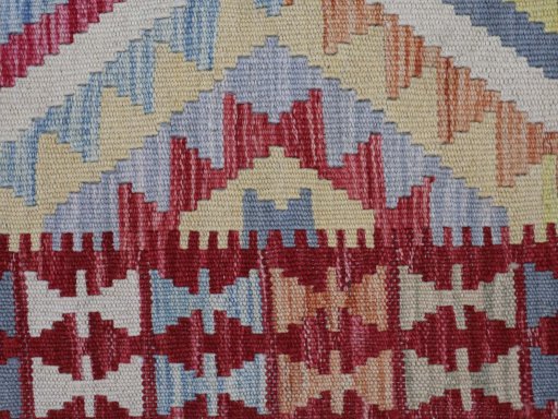 Backside of handmade New Modern Design rug showing knot structure and weave density